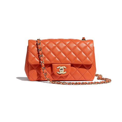 small orange chanel bag|Chanel orange handbag.